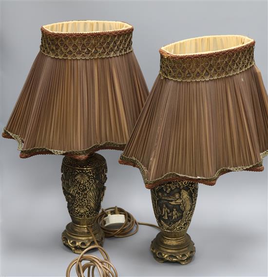 A pair of gilt composition Chinese style table lamps